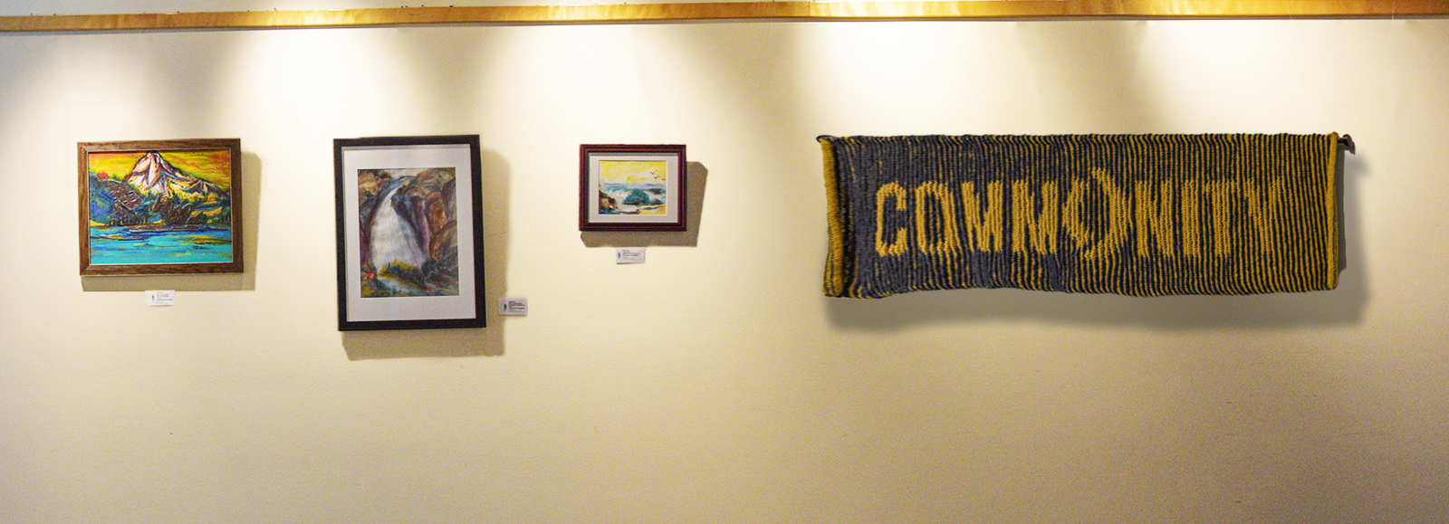 From left to right: watercolor paintings by&amp;nbsp;Qinqin Liu, Ph.D. ’90, and an illusion knit piece by&amp;nbsp;Gerry Elizondo ’98.