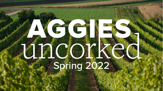 vineyard background with white aggies uncorked logo and spring 2022 text
