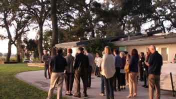 Group gathered around learning about the Heringer estate