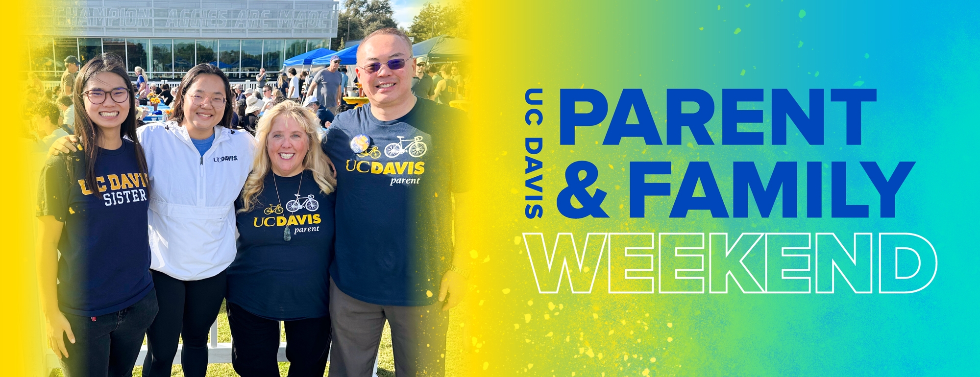 A group of four people posing with UC Davis apparel at a lunch on an outdoor lawn by the Activities and Recreation Center at UC Davis.