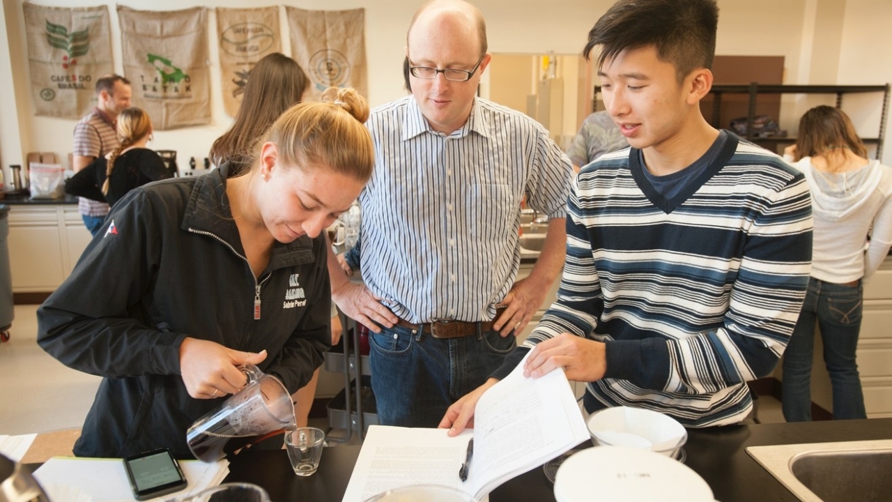 Chancellor’s Fellow William Ristenpart talks with students about the taste of their brew during a Design of Coffee class. Chancellor’s Fellow William Ristenpart talks with students about the taste of their brew during a Design of Coffee class.