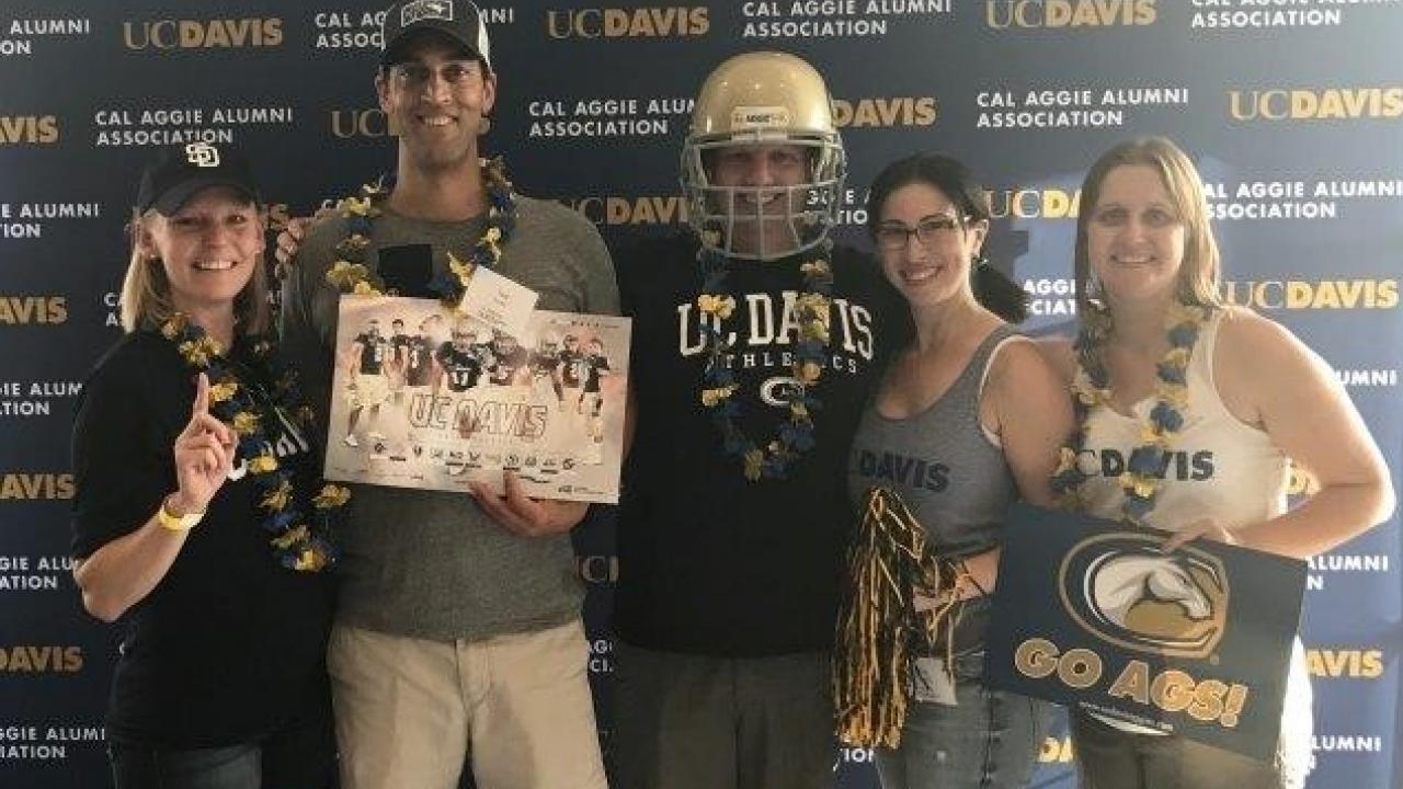 Alumni volunteers at a 2017 football game