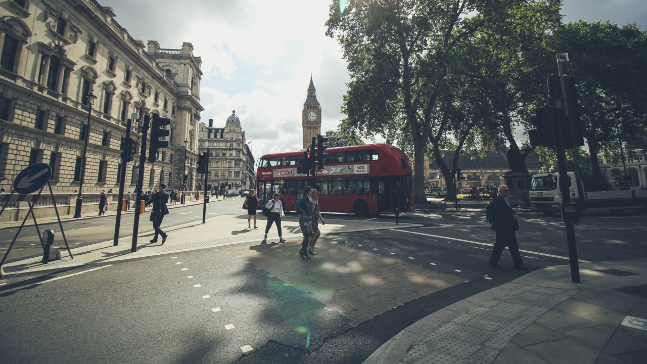 Picture of a London street of a doubledecker bus and Big Ben.