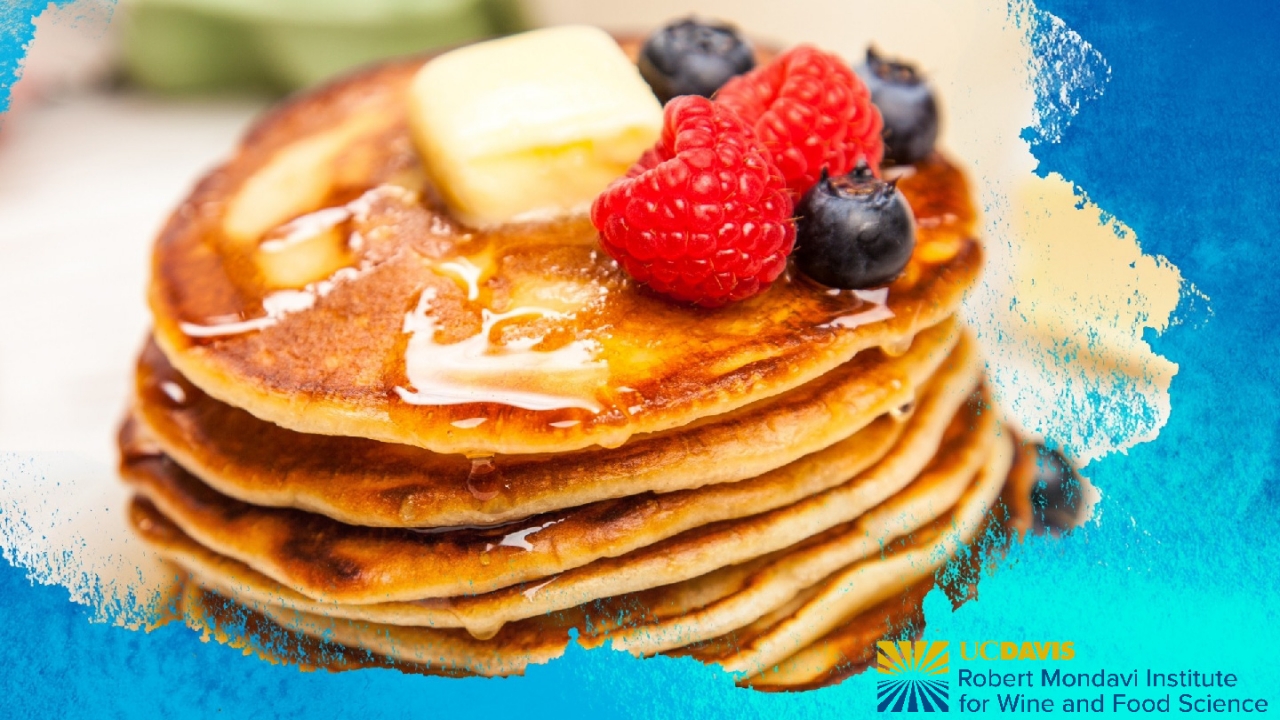 image of a stack of pancakes with butter and berries. Logo for the Robert Mondavi Institute for Wine and Food Science