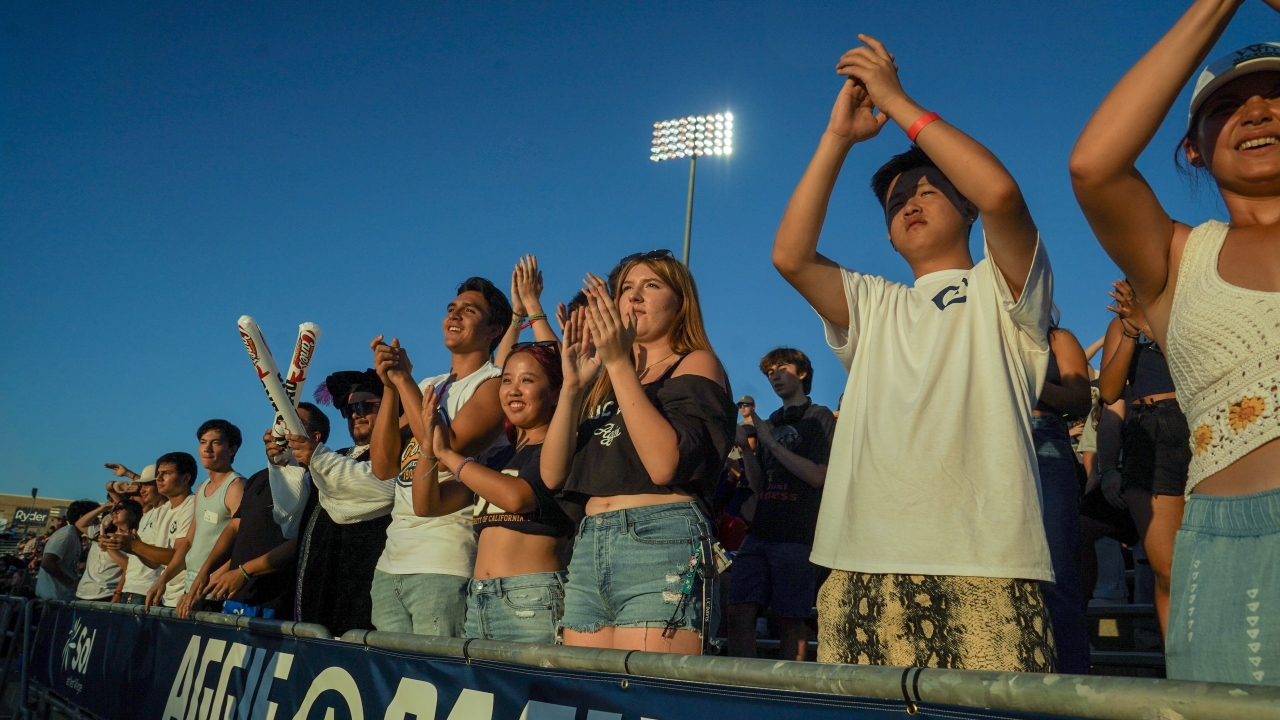 Students cheering of the Aggie football team at the UC Davis Health Stadium