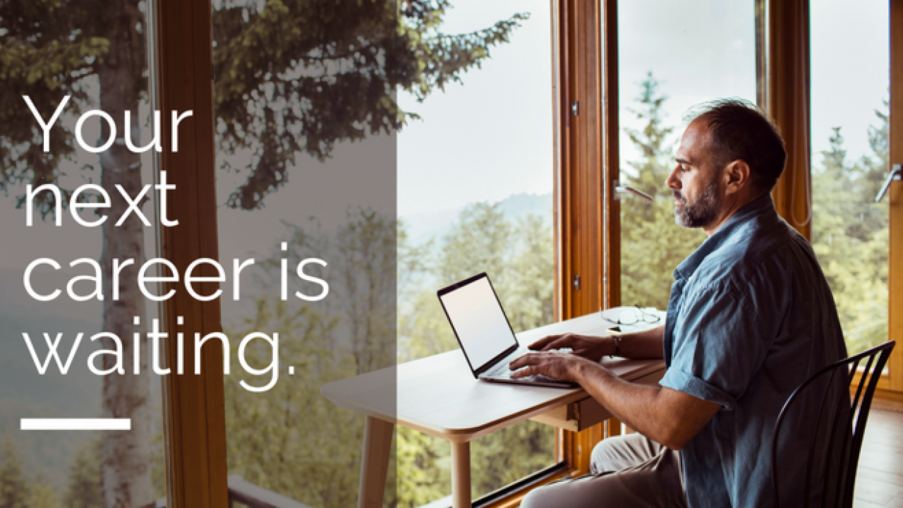 Image of man looking at and typing on computer. Text reads: "Your next career is waiting"