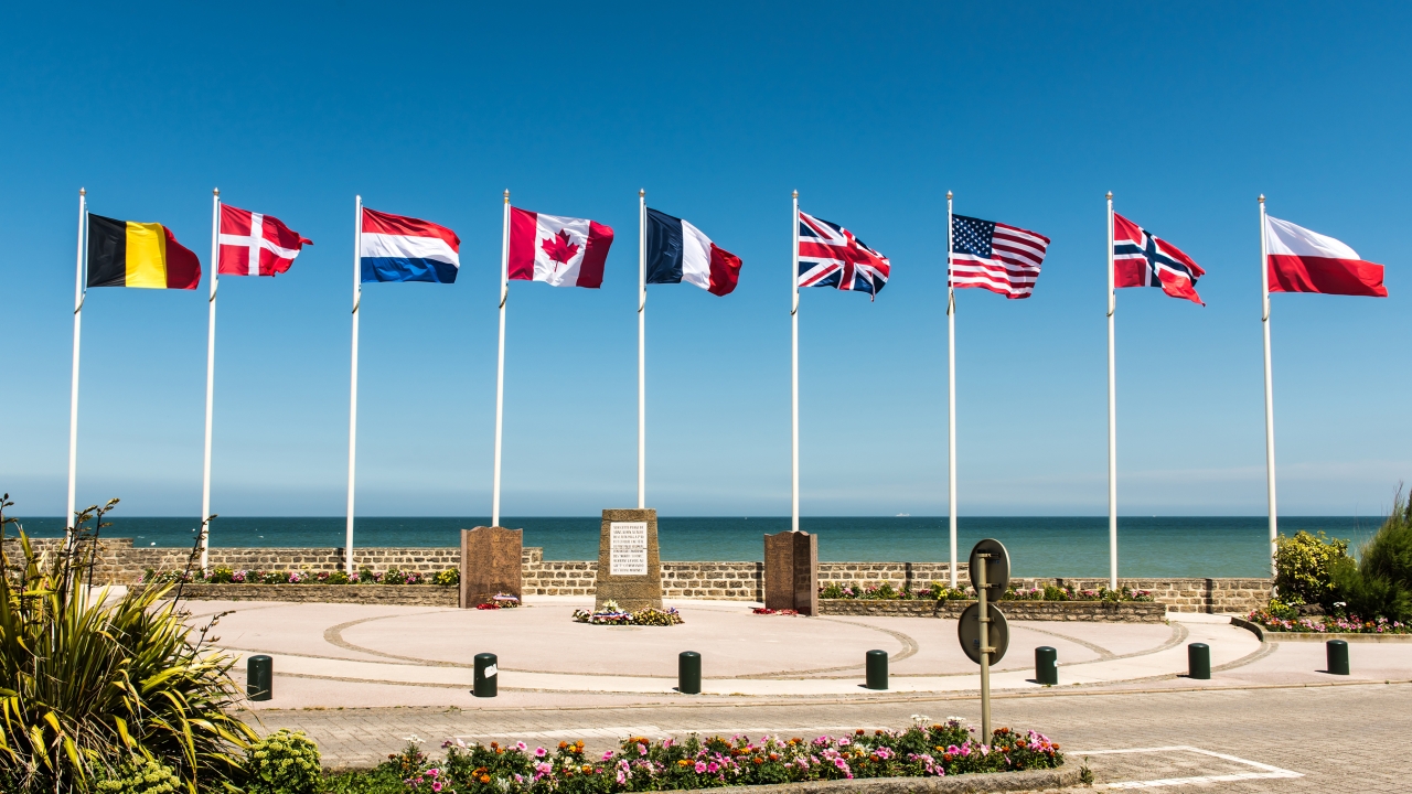 beachfront view with international flags
