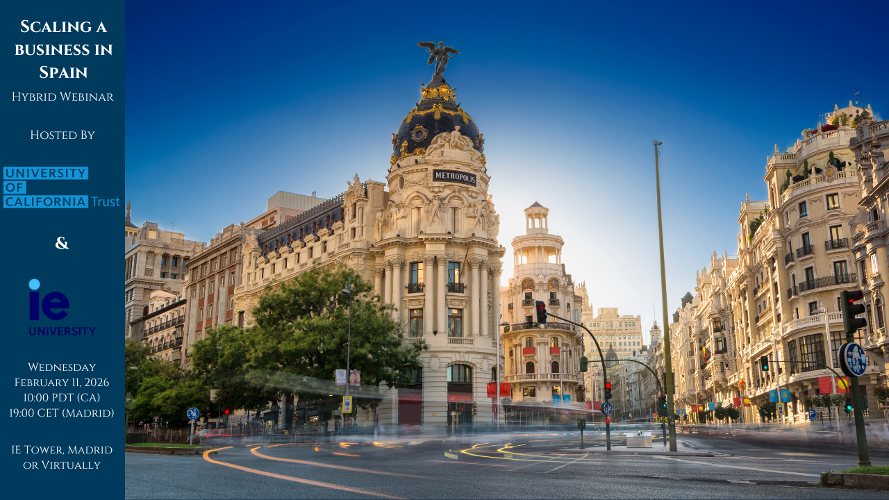 Photo of the Metropolis Building in Madrid, Spain with a blue ribbon on the side with text that reads "Starting a Business in Spain. Hybrid Webinar hosted by the University of California Trust and IE University. Wednesday, February 11, 2026 10:00 PDT (CA), 19:00 CET (Madrid). IE Univerity or VIrtually""