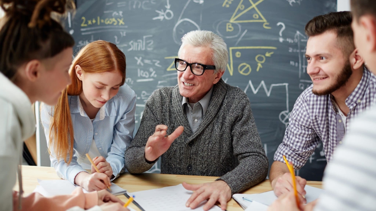 image of a professor talking with students