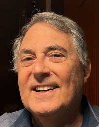 A headshot of artist Peter Shahrokh, PhD.