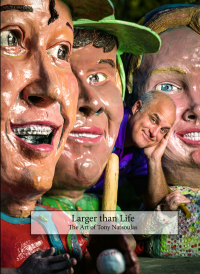 Cover art of Natsoulas’ book shows him peaking out smiling from a row of his large sculpture busts. The title text reads “Larger than Life: The Life and Art of Tony Natsoulas”