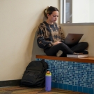 Second year Law student Ava Lindley studies outside of the IET compter rooms and media lab in the student community center on March 7, 2023.
