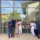 African and African American Alumni Association logo superimposed on a phot of the 5A Board at an event.