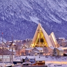 Ice and snow covered mountain and town 