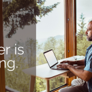Image of man looking at and typing on computer. Text reads: "Your next career is waiting"