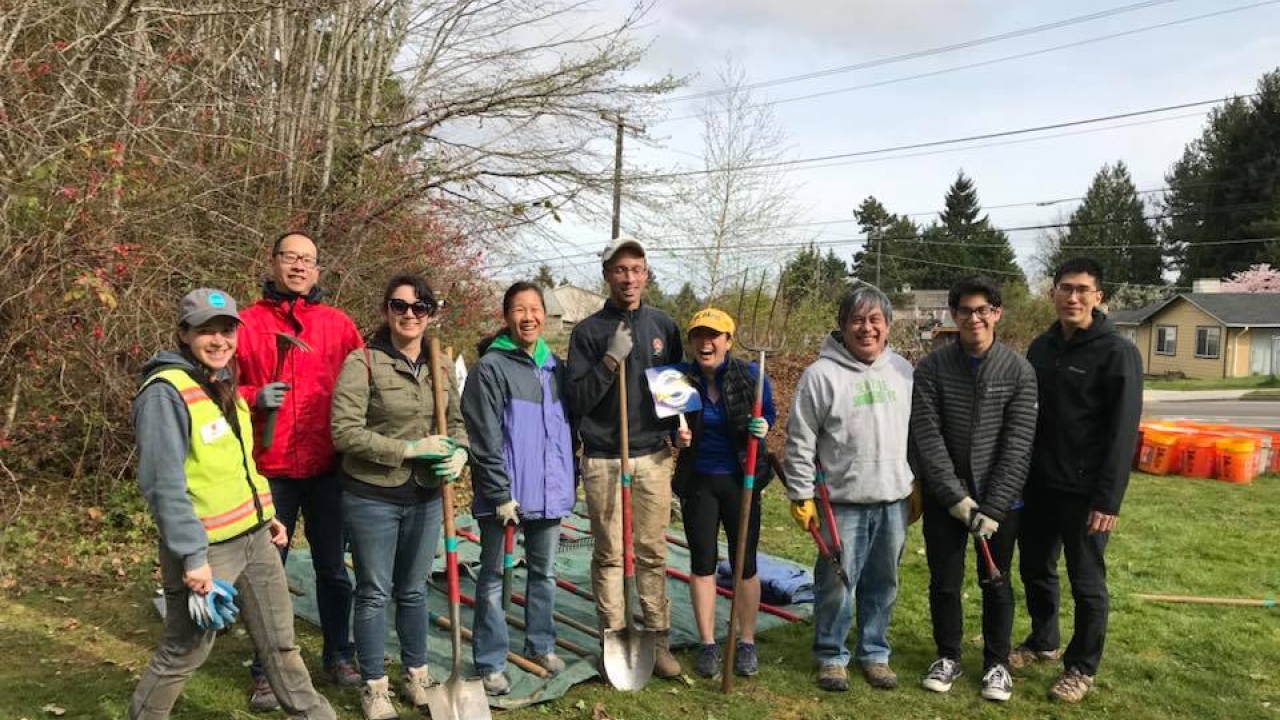 At our community service day in March 2018 at Kubota Gardens A group of UC Davis alumni in Seattle at a community service day posing with shovels outdoors